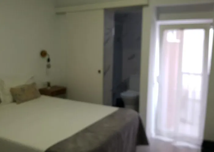 Henriqueta Maia Suits Quarto em Acomodações Particulares *